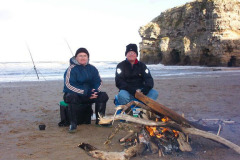 Fishing on Marsden beach, camp fire