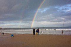 Fishing on Marsden beach, rainbow